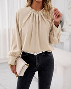 Elegant bluse med flæser