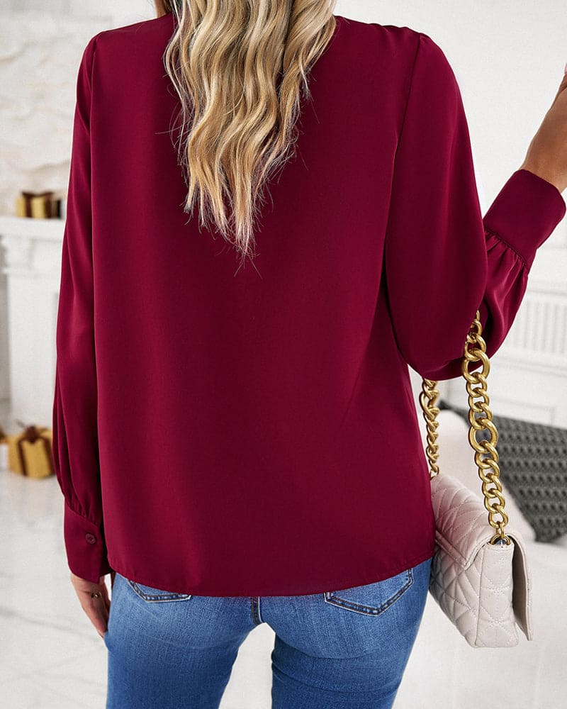 Elegant bluse med flæser