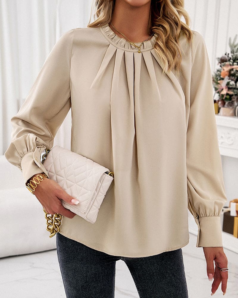 Elegant bluse med flæser