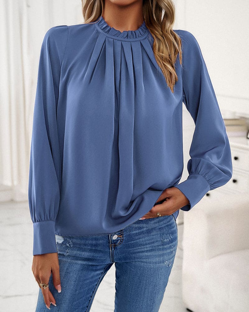 Elegant bluse med flæser