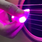 Lysende guitarplekter med rytme effekt