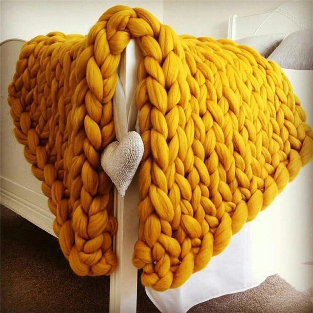 Chunky strikket tæppe til sofa